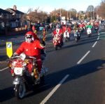Salford Santa Scooter Run  to The Christie